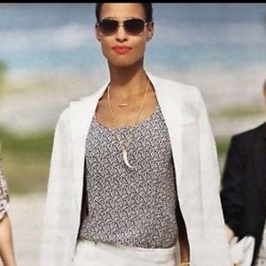 CAbi XL Animal Print racer back tank blouse.